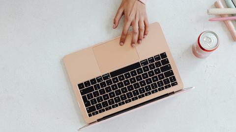 a person using a laptop computer