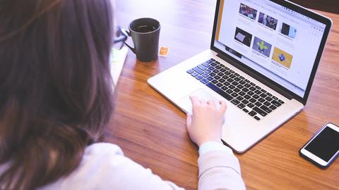 a woman working on a laptop