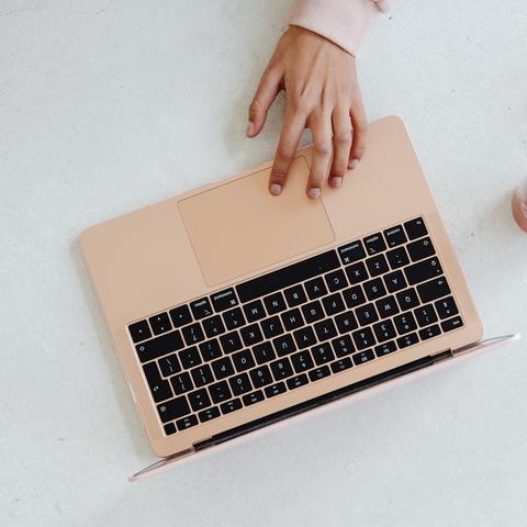 a person using a laptop computer